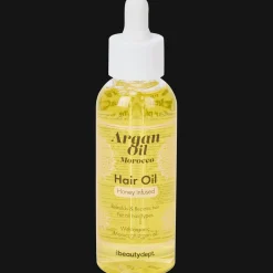 Action Huile capillaire The Beauty Dept. Huile d'argan et miel* Soins Capillaires